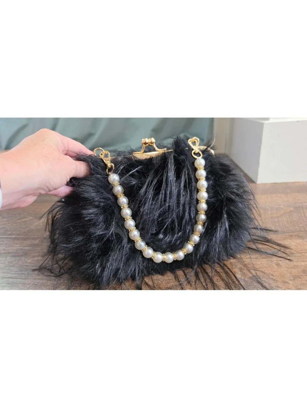Elegant Black Faux Fur Clutch Bag with Pearl Handle and Gold Frame